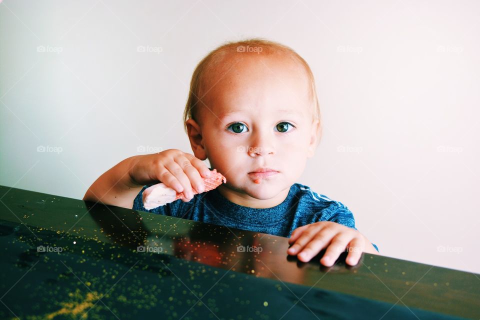 Close-up of a cute baby eating food