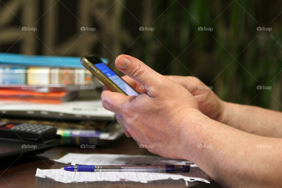 Using mobile phone and laptop