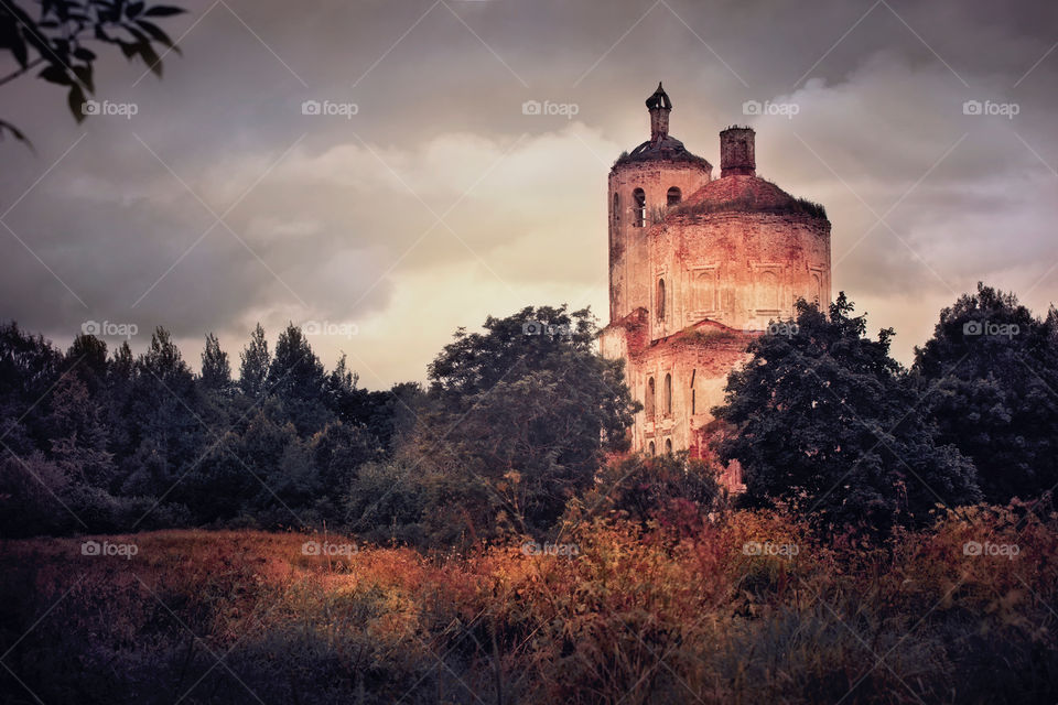 Old destroyed Christianity church at autumn 