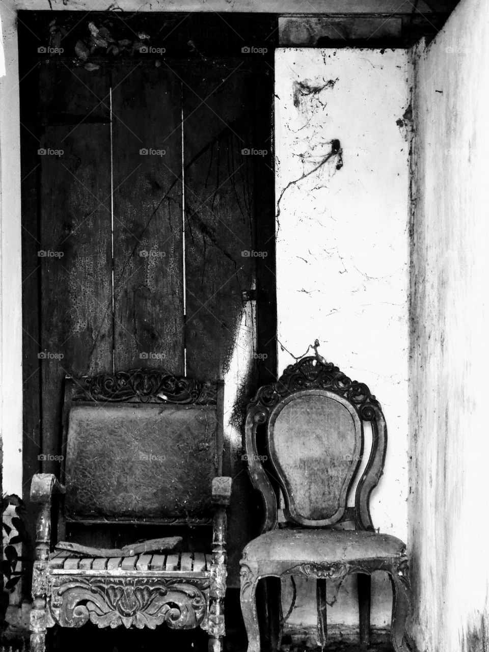 Uninhabited carved wooden chairs