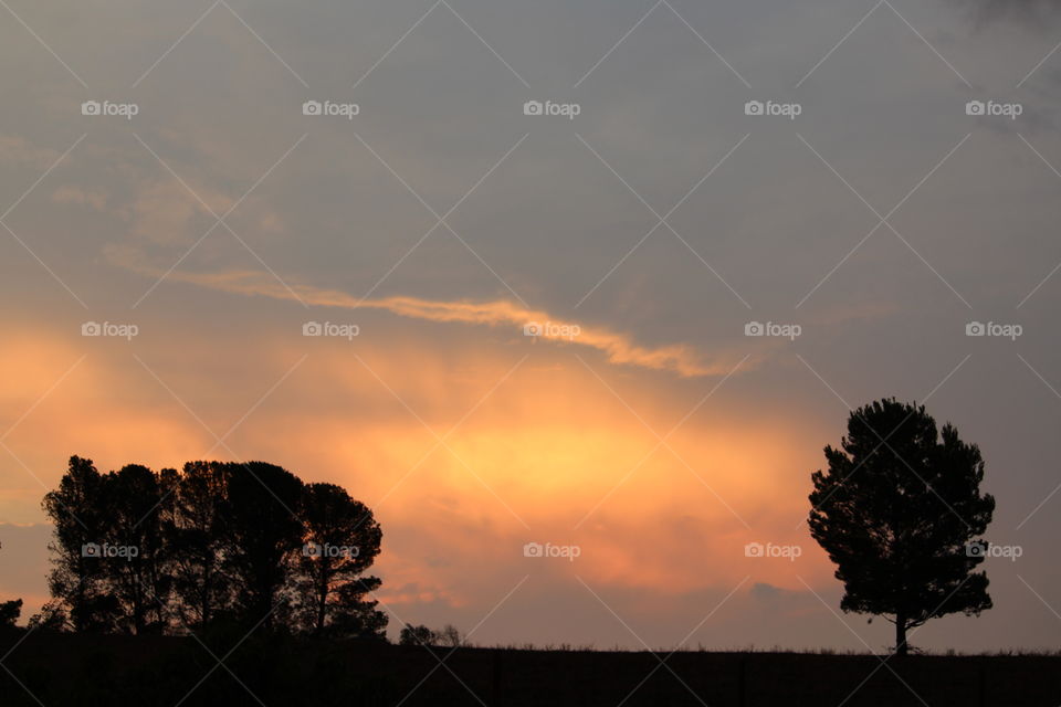 Sunlight glowing through the afternoon stormy cloud