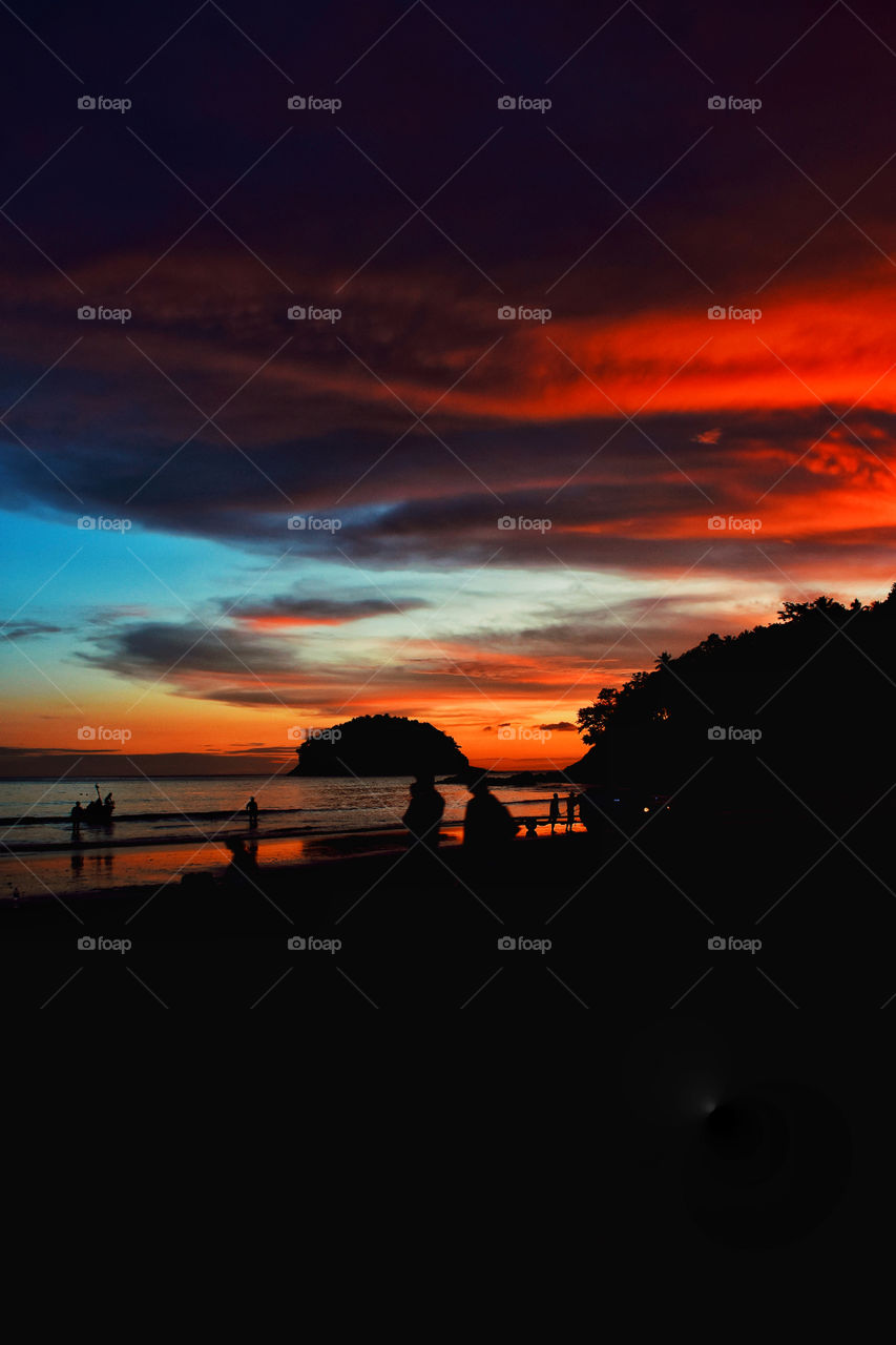 Sunset beach Phuket Thailand burning sky 