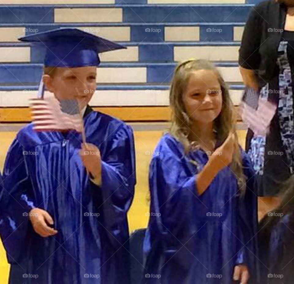 Two students with American flag