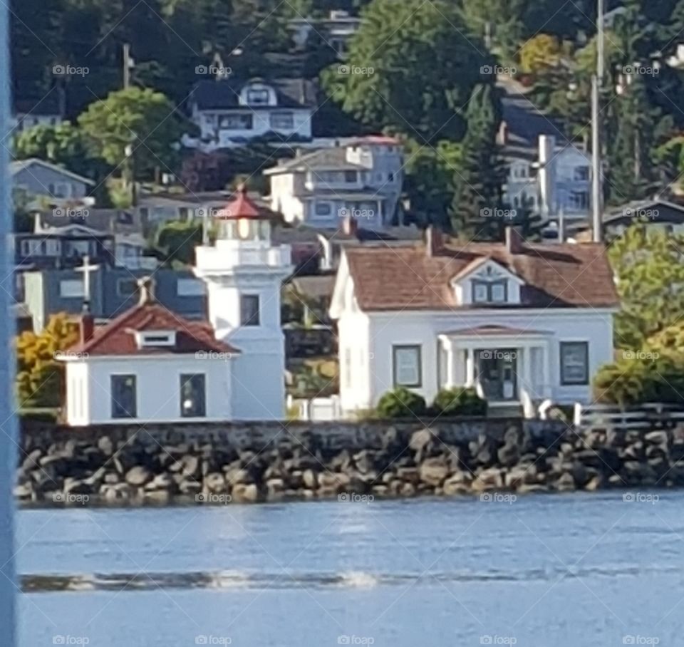 Small Lighthouse On Pier