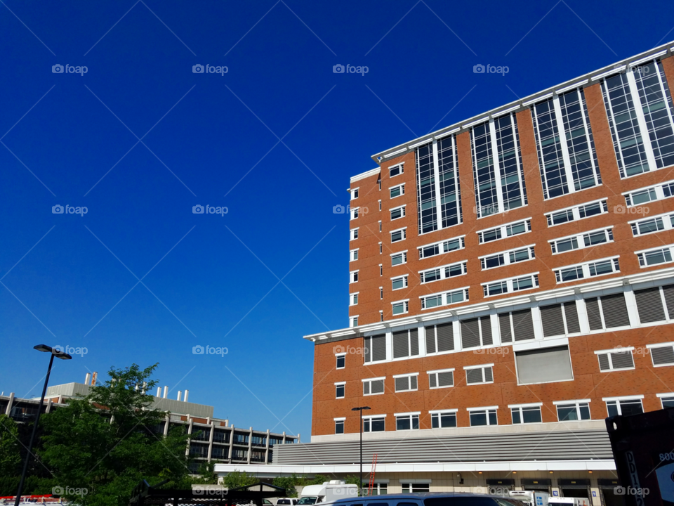 A hospital standing tall and watching their charges