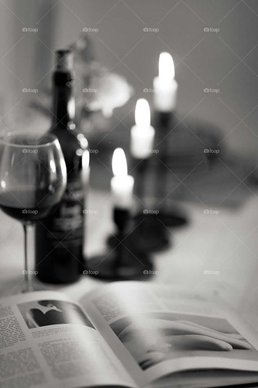 A bottle of vintage French wine on a dinner table 