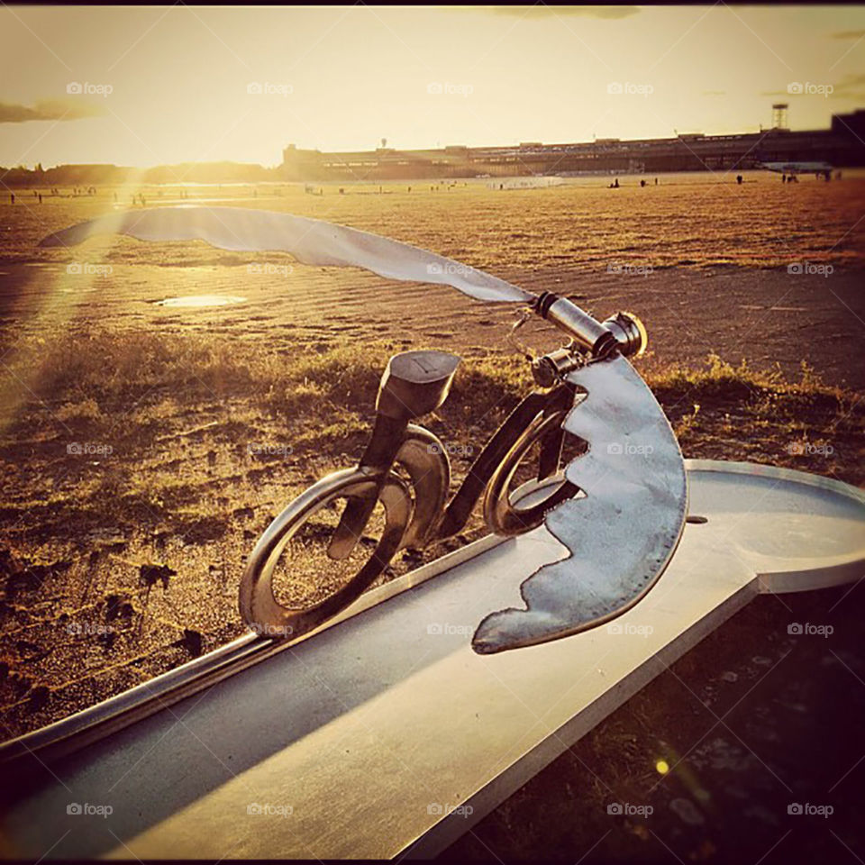 Flying to the sun. 
Taken at former Tempelhof Airport in Berlin, while looking for a way to reach the sun. 