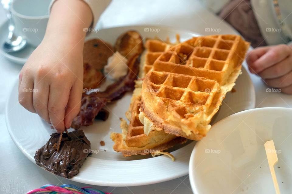 "Nutella", "waffles", "brunch", "eating"