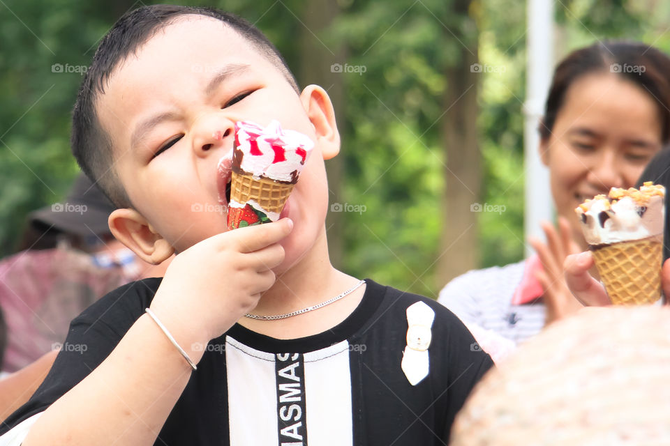A boy eating an ice-cream