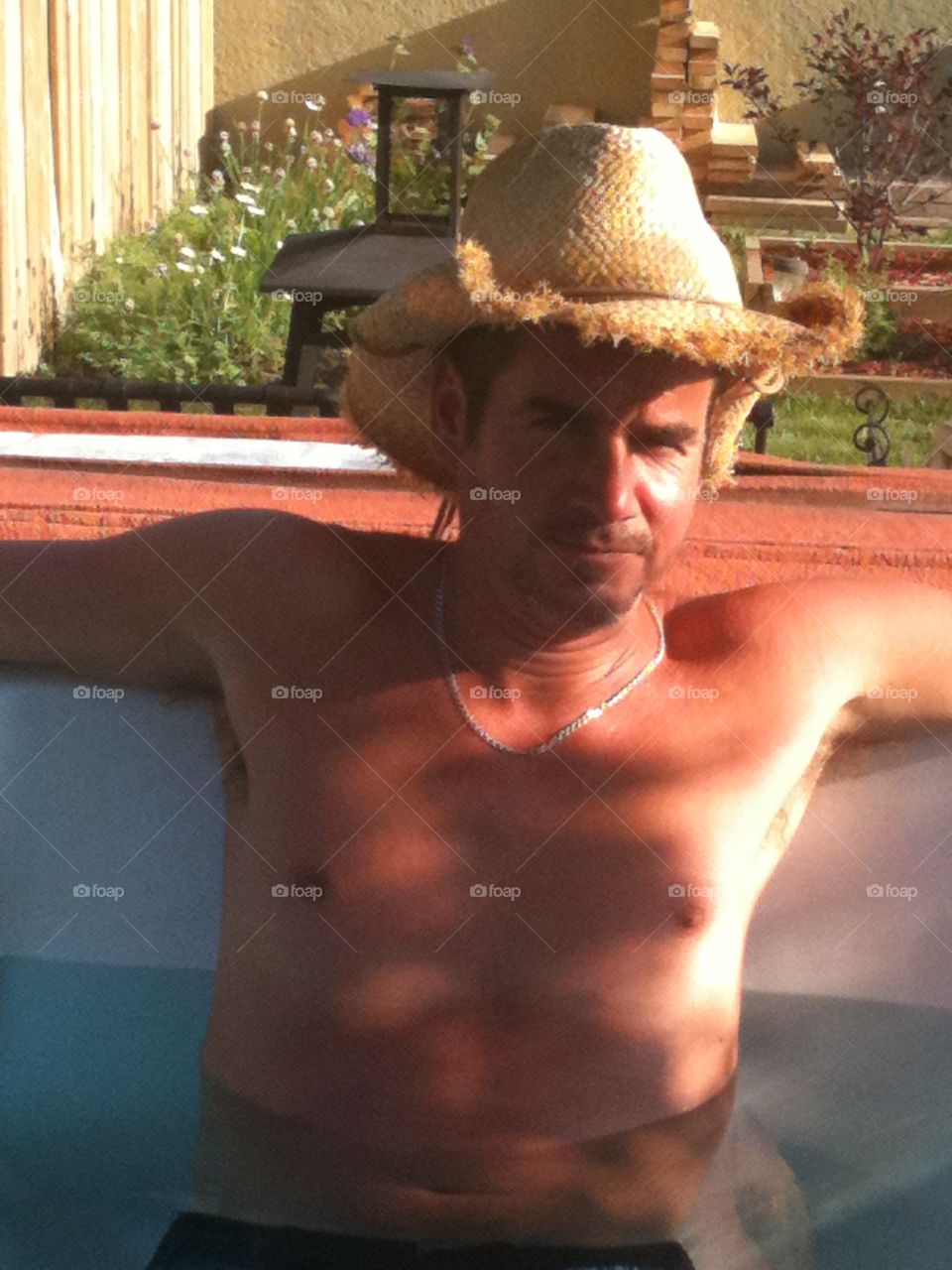 Cowboy in hot tub