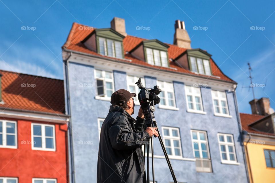 Professional photographer taking photos in Nyhavn, Copenhagen