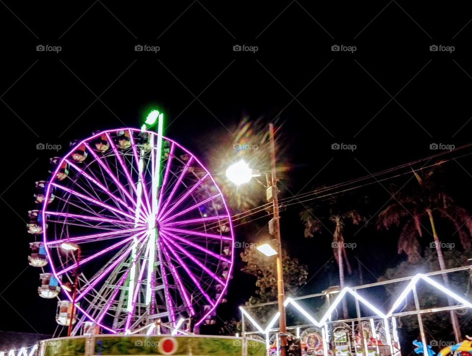 Ferris wheel carnival purple lighting