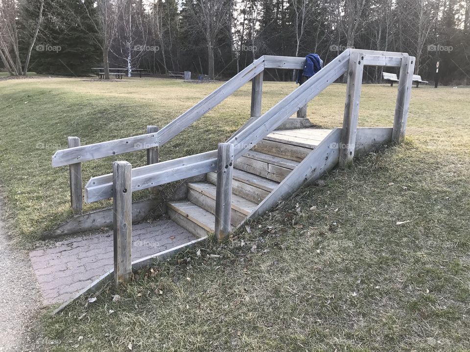 Stairs going up a hill.