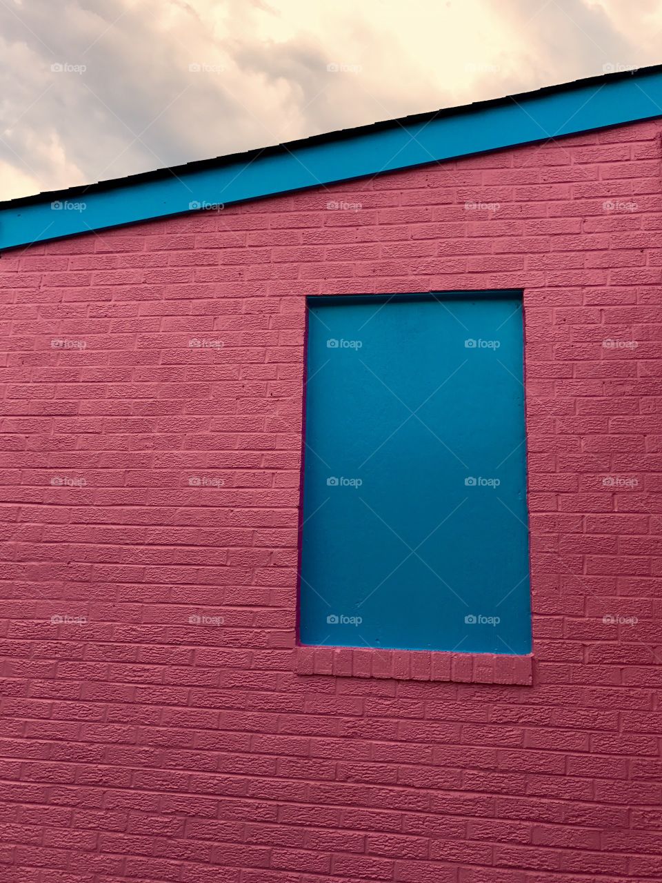 Pink Wall & Blue Boarded Window