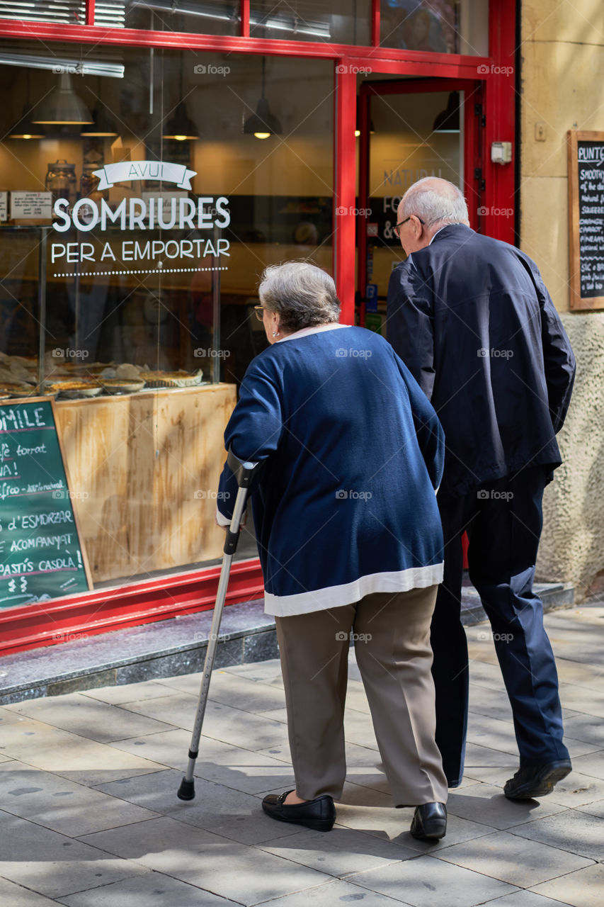 Elderly couple in the street