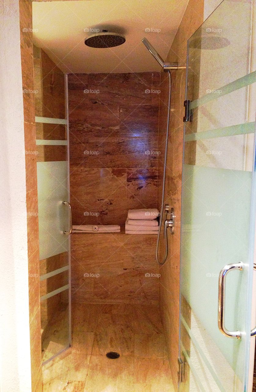 Luxury awaits . This shower was so large it had 2 doors! 