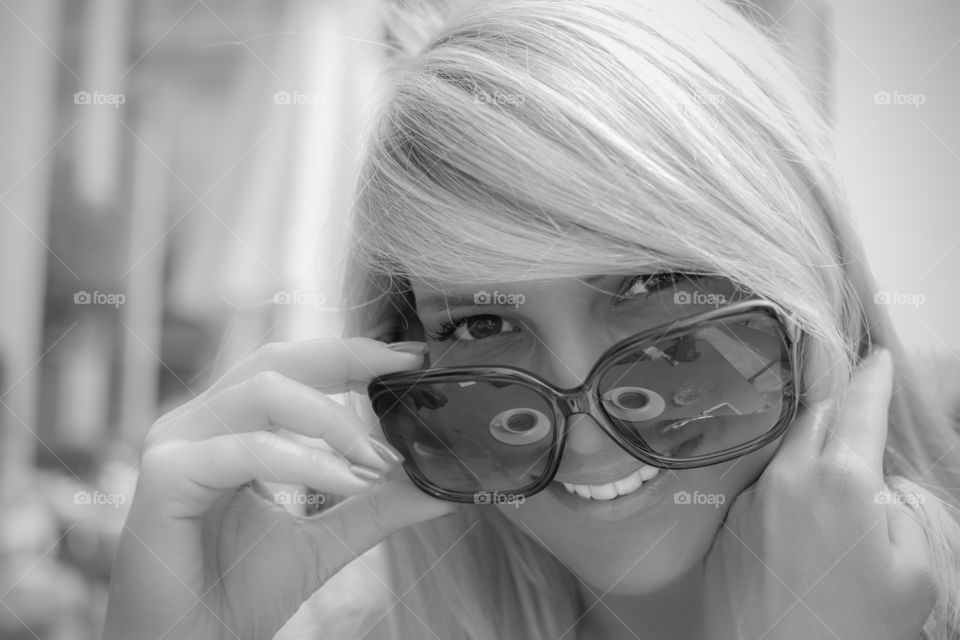 Close-up of a woman wearing sunglasses