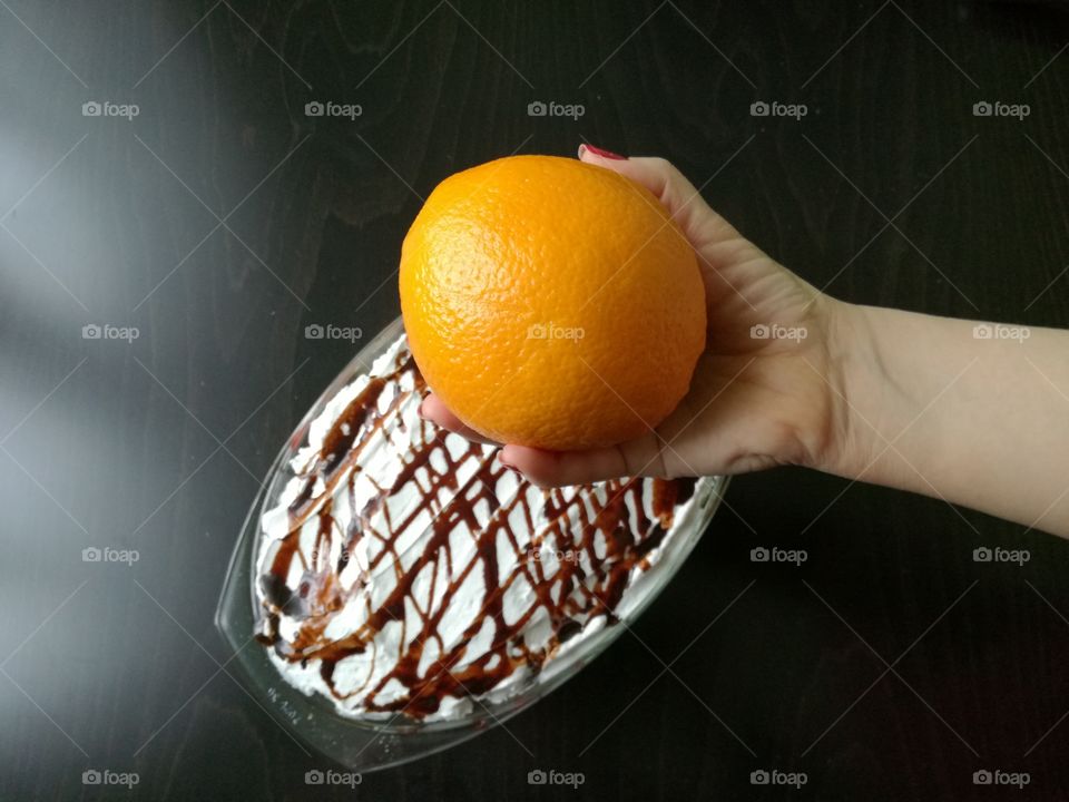 holding oranges