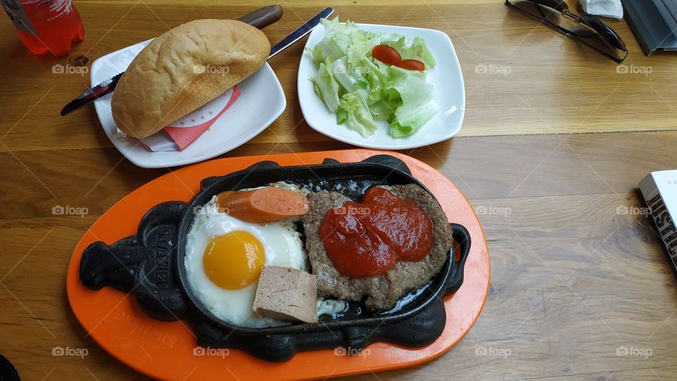 Beef steak with Banh Mi (bread) in Vietnam