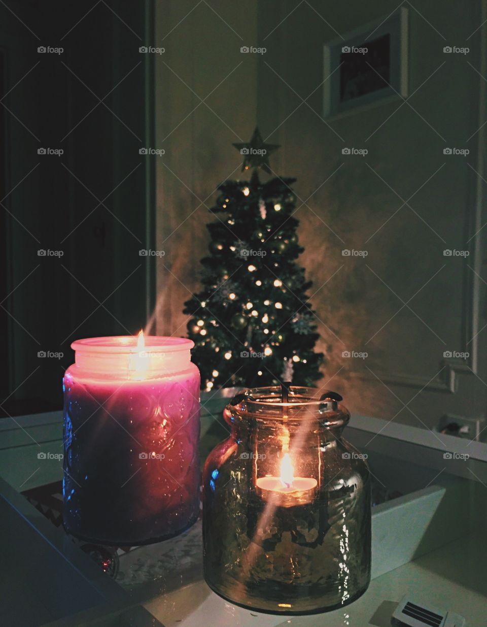 Candles and Christmas tree in the living room