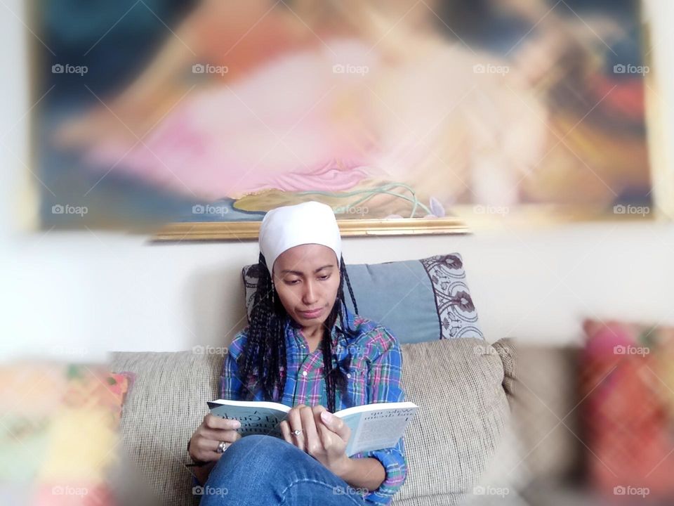 A woman reading a dream book