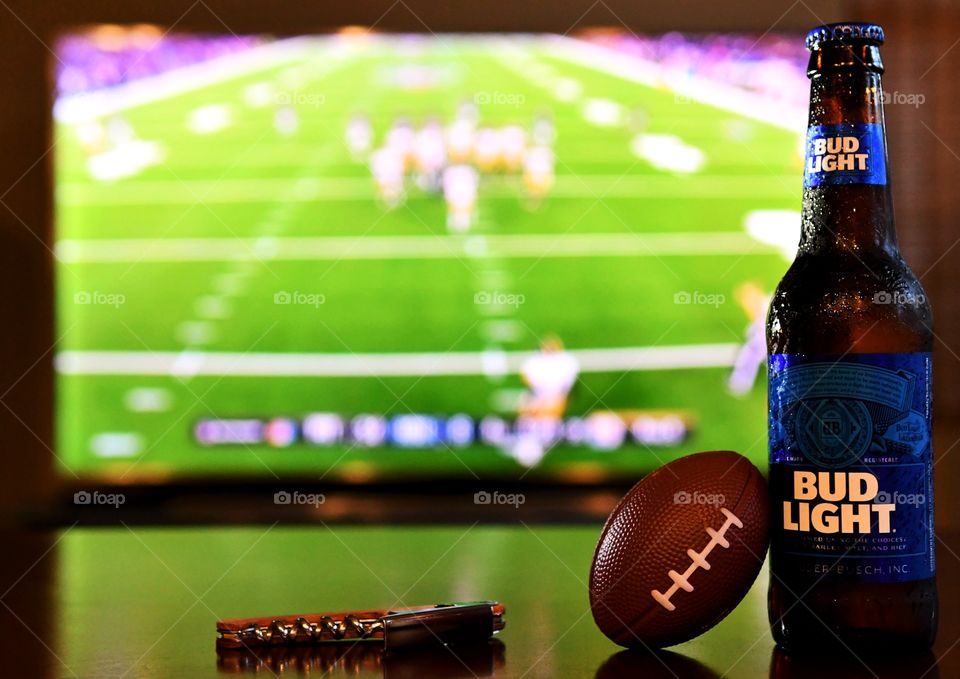 Enjoying football game night with Bud Light