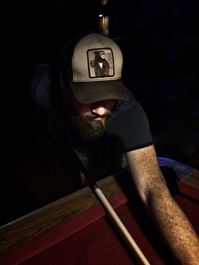 Playing pool. Just another night out with this fella. 