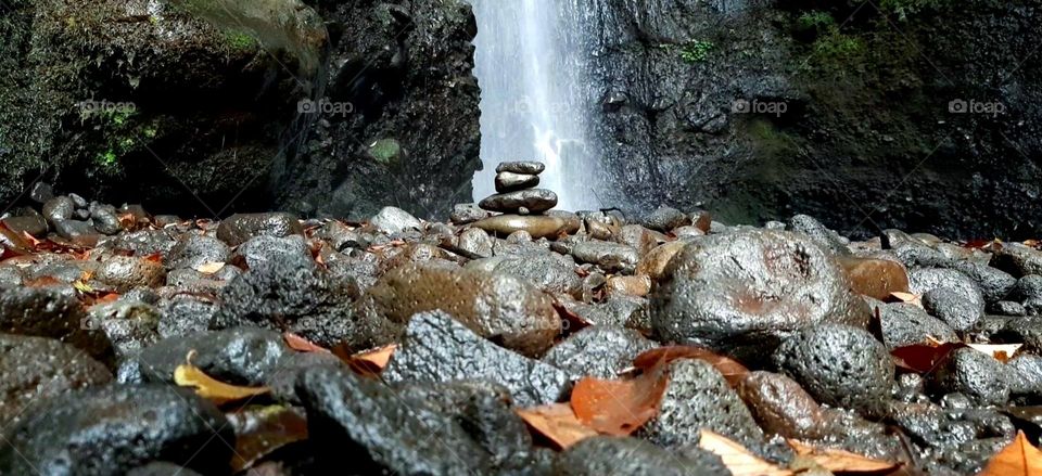 rock balancing and waterfall