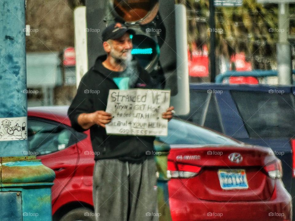 Homeless Veteran Begging On A Streetcorner