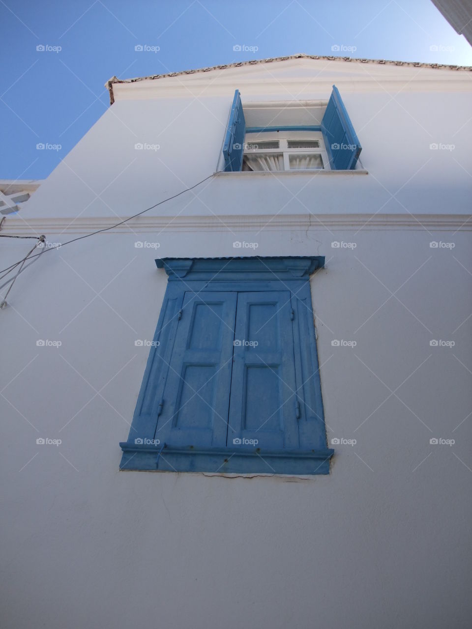 Blue window shutters 