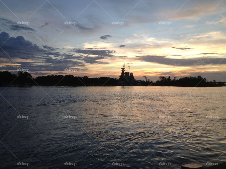 Waterfront during sunset. Sunset over Wilmington NC river with boats