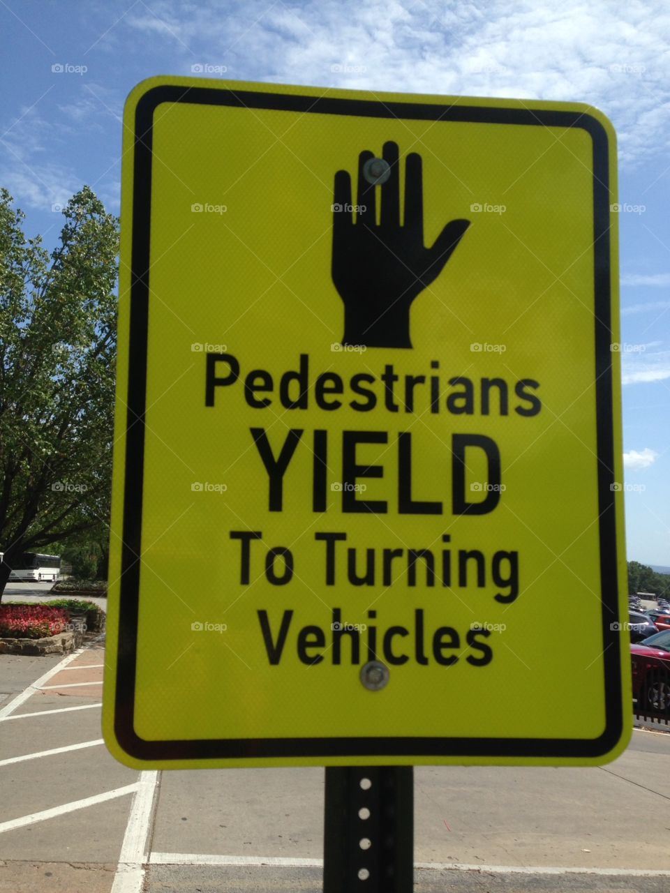 Sign to yield to pedestrians 