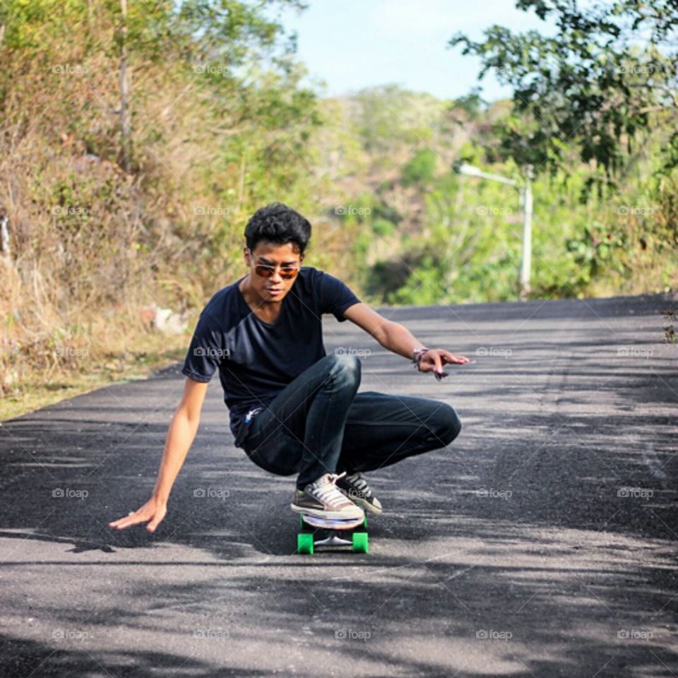 longboard rider. this picture is was me when I'm lazy to walk