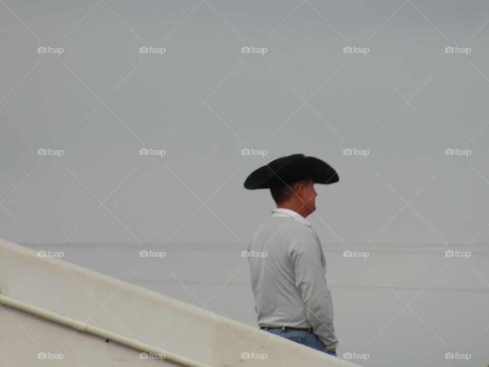 Tex. This is a picture of a fan at the pee wee football game.