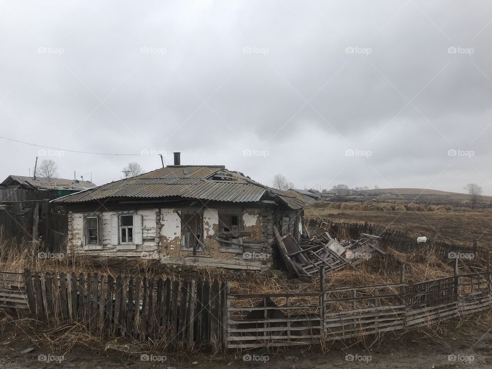 An old house on the edge of the road