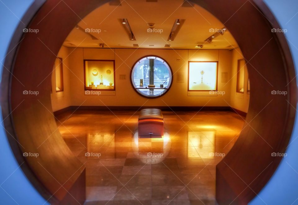 Crowe Museum of Asian Art Exhibit Room with a circle door and window