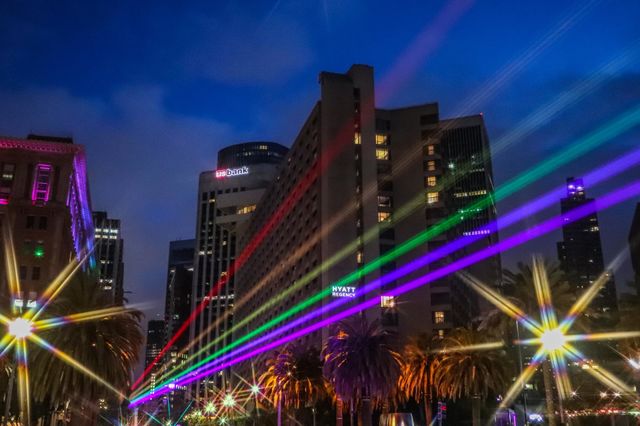 Light display for San Francisco Pride 2023 projecting the colors of the Pride Rainbow Flag down Market Street from the Ferry Building on the Embarcadero 