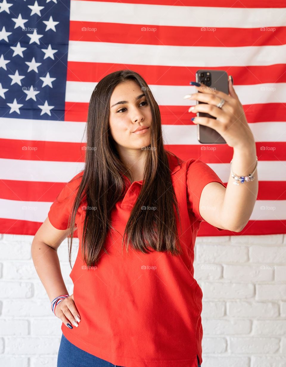 woman holding USA flag