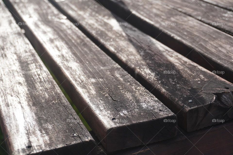 Worn wood texture of a garden bench