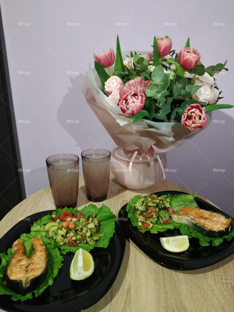 delicious grilled salmon steak and vegetable salsa - homemade food and a cozy evening