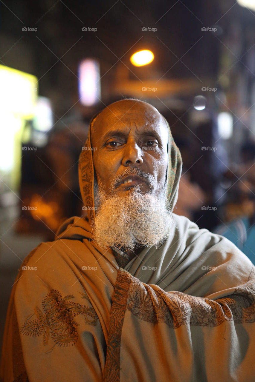 Bengali old man looking in camera