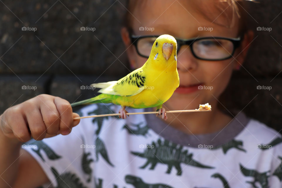 Child holding a bungee bird