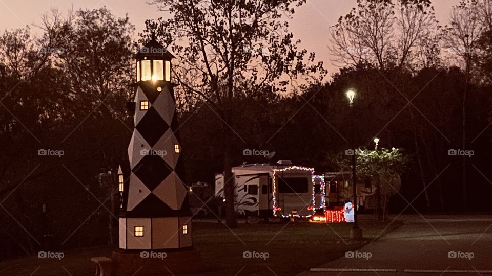 Night is near. Peaceful illuminating backlit. Night is here and what a gorgeous one it is. Neighbour’s camping near with seasonal lighting glowing. 
