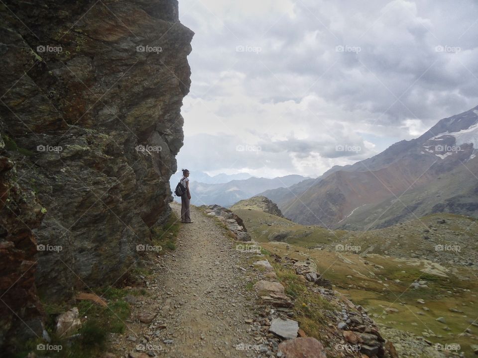 Trekking time. Trekking time in a trail of high mountain
