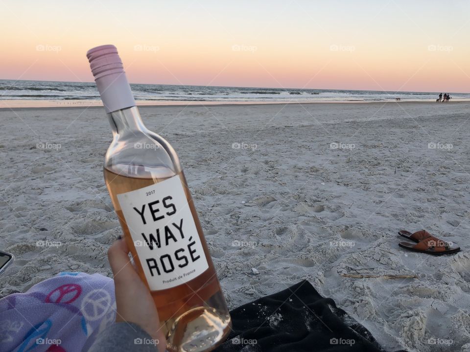 Rosé during sunset on the beach