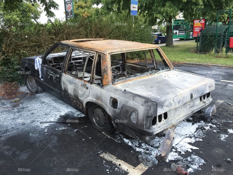 burned-out car in Sweden.