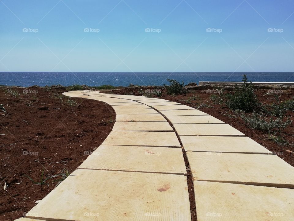 Driveway leading to the sea