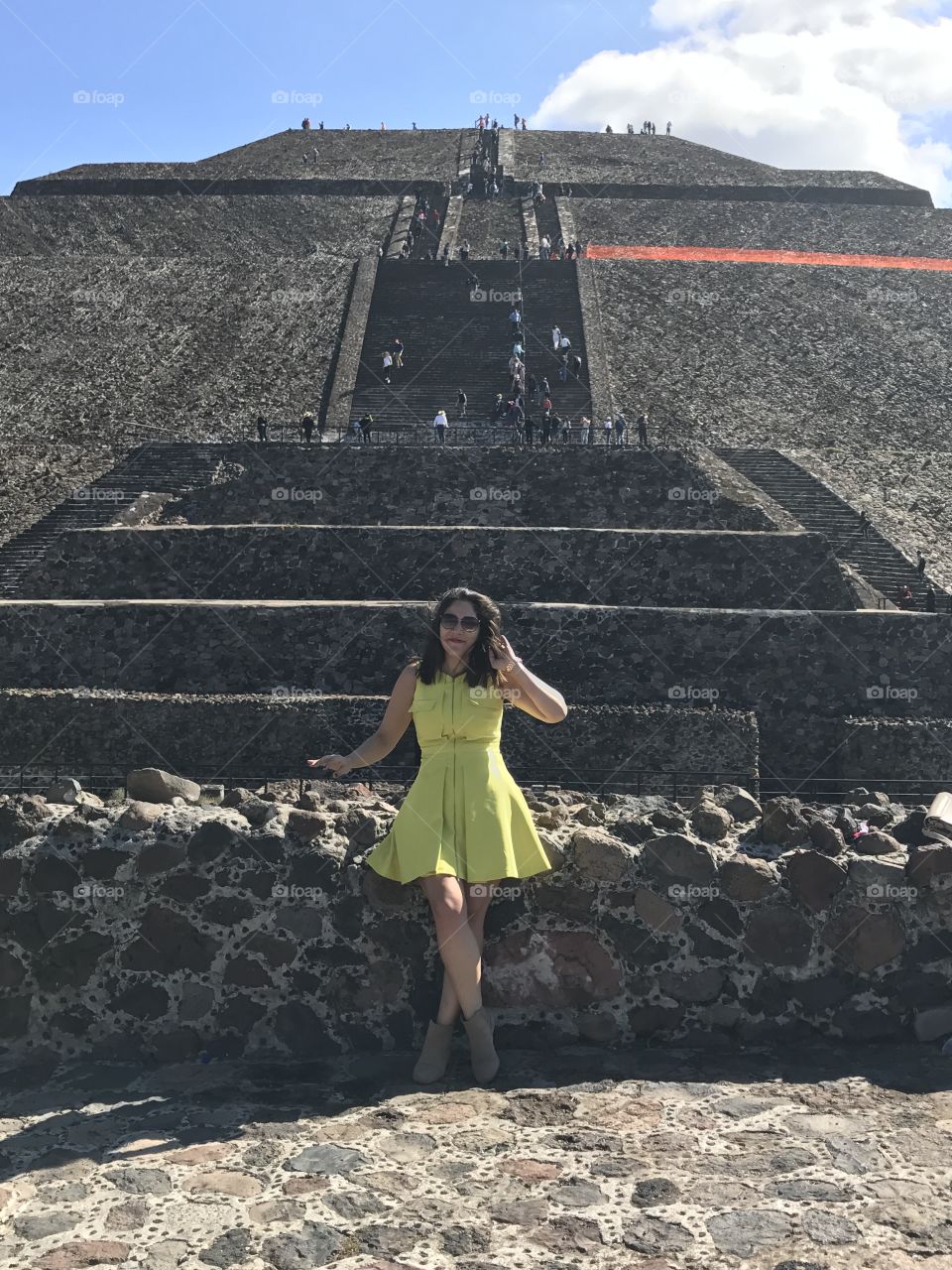 Woman posing at Pyramid of the Sun, Mexico