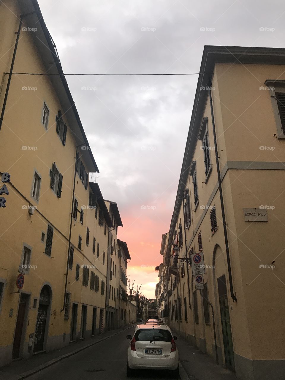 Evening sky slicing through Borgo Pinti in Florence, Italy.