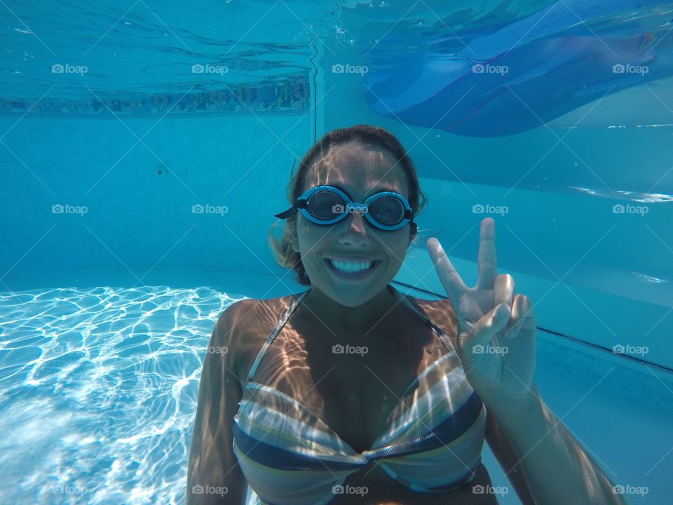 Woman swimming underwater